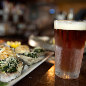 Ice cold beer with oysters at Atlas Oyster by Matthew Coughlin Photography